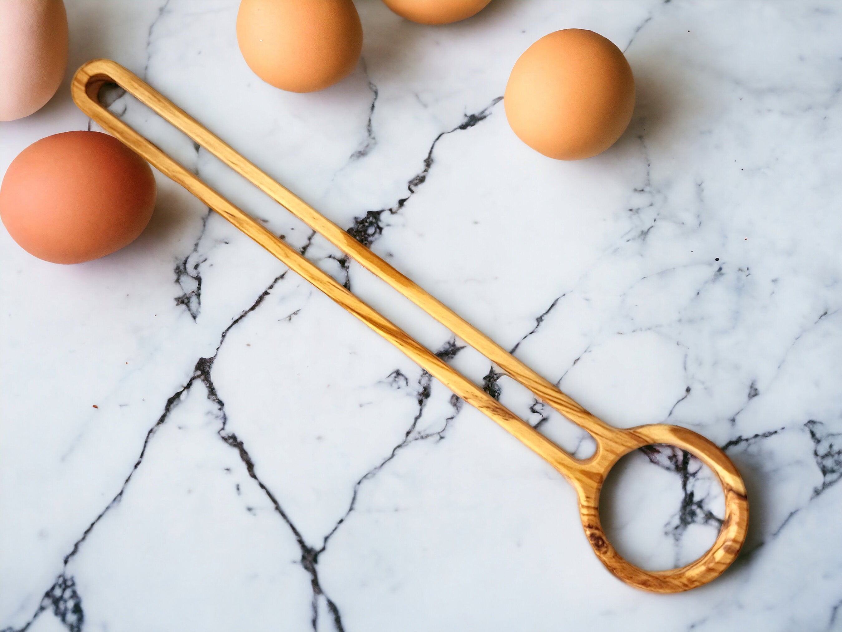 Egg beater outlet utensil